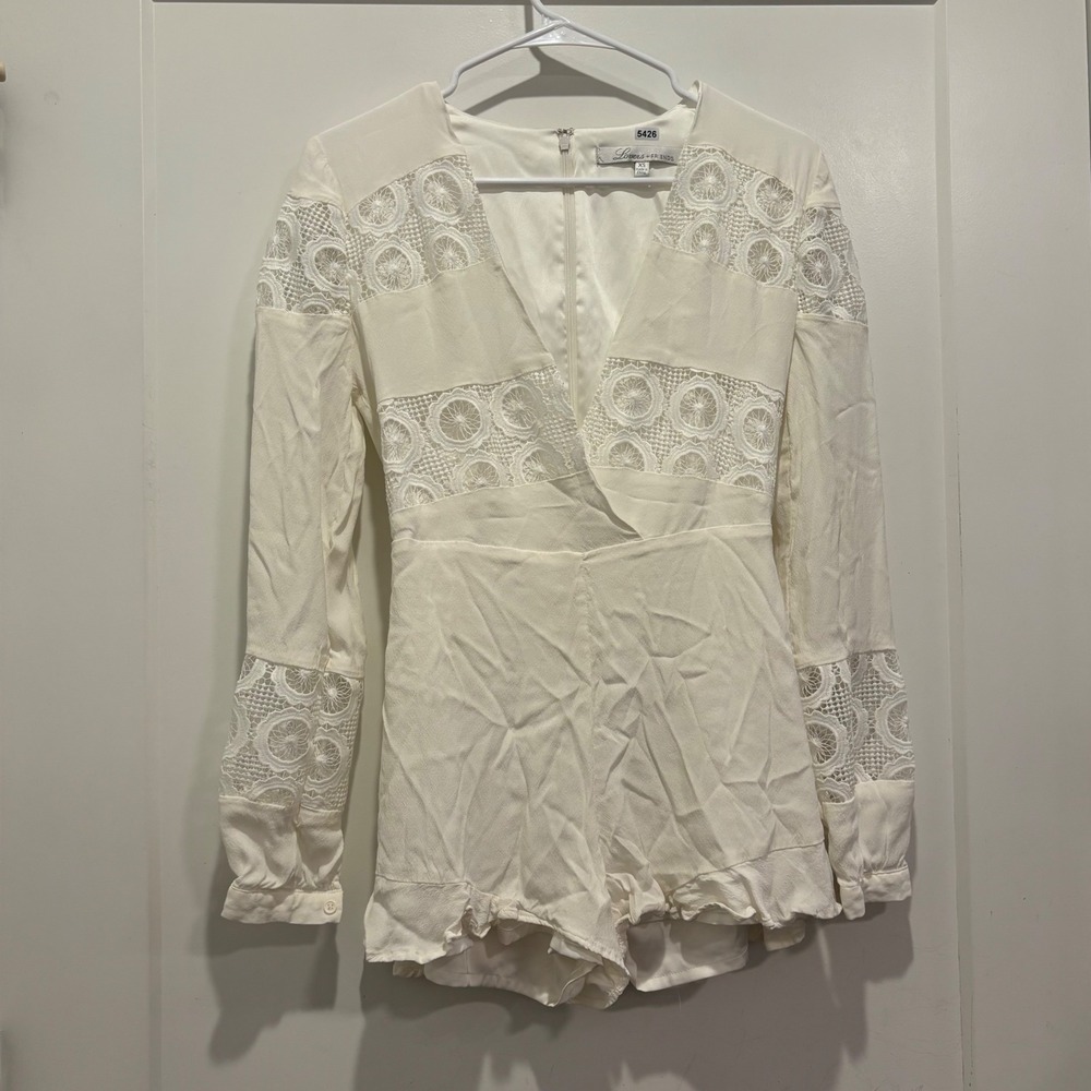Lovers + Friends White Crochet Lace Long Sleeve Romper XS Ruffle Hem V-Neck